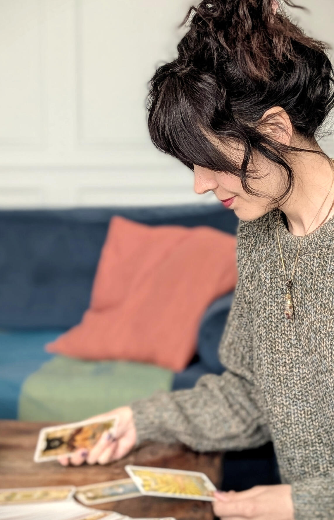 woman consulting tarot cards